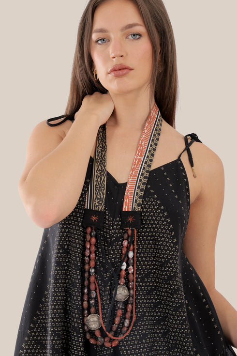 long Sleeveless dress with asymmetric hemline